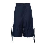 Comme des Garçons Dragsko Knä Shorts med Fickor Blue, Herr