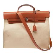 Hermès Vintage Pre-owned Canvas handvskor Beige, Dam