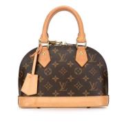 Louis Vuitton Vintage Pre-owned Canvas handvskor Brown, Dam