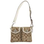 Coach Pre-owned Pre-owned Tyg axelremsvskor Beige, Dam