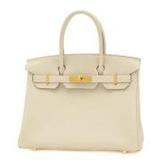 Hermès Vintage Pre-owned Tyg handvskor Beige, Dam