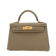 Hermès Vintage Pre-owned Tyg handvskor Beige, Dam