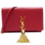 Yves Saint Laurent Vintage Pre-owned Tyg axelremsvskor Red, Dam