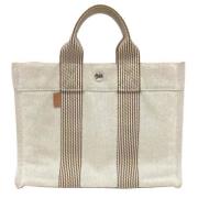 Hermès Vintage Pre-owned Tyg handvskor Beige, Dam