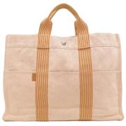 Hermès Vintage Pre-owned Canvas handvskor Beige, Dam