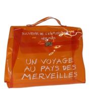 Hermès Vintage Pre-owned Vinyl handvskor Orange, Dam