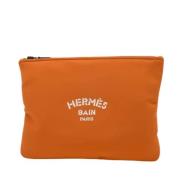 Hermès Vintage Pre-owned Tyg kuvertvskor Orange, Herr