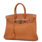 Hermès Vintage Pre-owned Laeder handvskor Orange, Dam