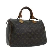 Louis Vuitton Vintage Pre-owned Belagd canvas handvskor Brown, Dam