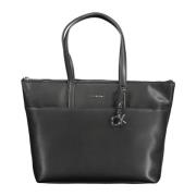 Calvin Klein Elegant svart axelväska med kontrasterande detaljer Black...