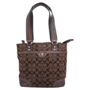 Coach Pre-owned Pre-owned Belagd canvas axelremsvskor Brown, Dam