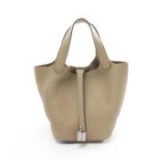 Hermès Vintage Pre-owned Laeder handvskor Beige, Dam