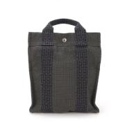 Hermès Vintage Pre-owned Canvas handvskor Gray, Dam