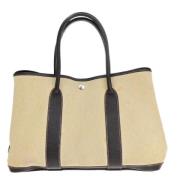 Hermès Vintage Pre-owned Canvas handvskor Beige, Dam