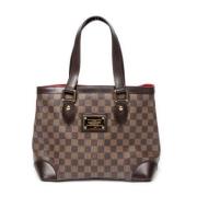 Louis Vuitton Vintage Pre-owned Belagd canvas axelremsvskor Brown, Dam