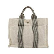 Hermès Vintage Pre-owned Canvas handvskor Beige, Dam