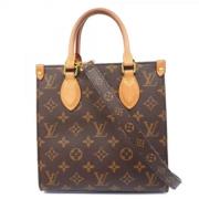 Louis Vuitton Vintage Pre-owned Tyg handvskor Brown, Dam