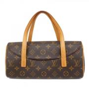 Louis Vuitton Vintage Pre-owned Tyg handvskor Brown, Dam