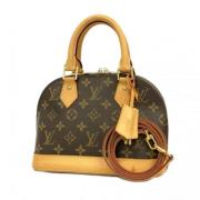 Louis Vuitton Vintage Pre-owned Tyg handvskor Brown, Dam