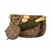 Louis Vuitton Vintage Pre-owned Tyg kuvertvskor Brown, Dam