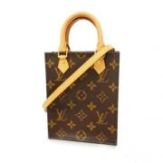 Louis Vuitton Vintage Pre-owned Tyg handvskor Brown, Dam