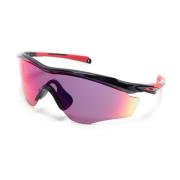 Oakley Svart/Röd Sköldram Solglasögon Purple, Unisex