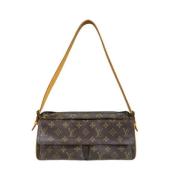 Louis Vuitton Vintage Pre-owned Canvas axelremsvskor Brown, Dam