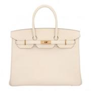 Hermès Vintage Pre-owned Laeder handvskor Beige, Dam