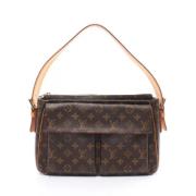 Louis Vuitton Vintage Pre-owned Canvas axelremsvskor Brown, Dam