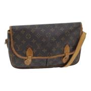 Louis Vuitton Vintage Pre-owned Canvas axelremsvskor Brown, Dam