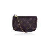 Louis Vuitton Vintage Pre-owned Tyg kuvertvskor Brown, Dam