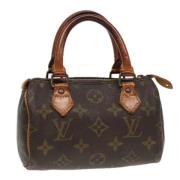 Louis Vuitton Vintage Pre-owned Canvas handvskor Brown, Dam