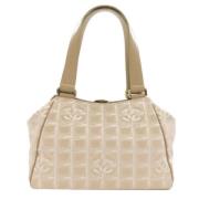 Chanel Vintage Pre-owned Nylon chanel-vskor Beige, Dam