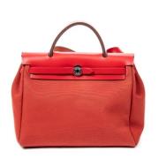 Hermès Vintage Pre-owned Canvas handvskor Red, Dam