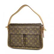 Louis Vuitton Vintage Pre-owned Tyg axelremsvskor Brown, Dam