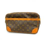 Louis Vuitton Vintage Pre-owned Tyg kuvertvskor Brown, Dam