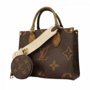 Louis Vuitton Vintage Pre-owned Tyg handvskor Brown, Dam