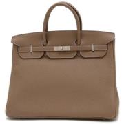 Hermès Vintage Pre-owned Laeder handvskor Brown, Dam