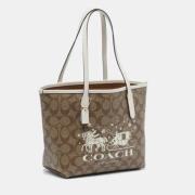 Coach Pre-owned Pre-owned Belagd canvas axelremsvskor Beige, Dam