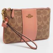 Coach Pre-owned Pre-owned Belagd canvas kuvertvskor Beige, Dam