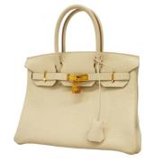 Hermès Vintage Pre-owned Laeder handvskor Beige, Dam