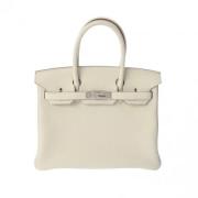 Hermès Vintage Pre-owned Laeder handvskor Beige, Dam