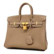 Hermès Vintage Pre-owned Laeder handvskor Beige, Dam