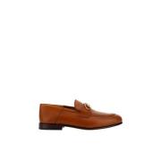 Salvatore Ferragamo Guldpläterade kalvskinnloafers med blockklack Brow...