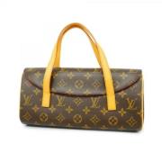 Louis Vuitton Vintage Pre-owned Tyg handvskor Brown, Dam