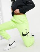 Nike – Gröna mjukisbyxor med Swoosh-logga