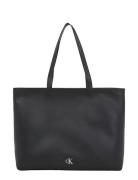 Calvin Klein Minimal Monogram Slim Tote34 T Svart