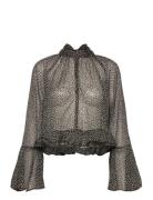 Mango Floral-Print Blouse With Ruffles Svart